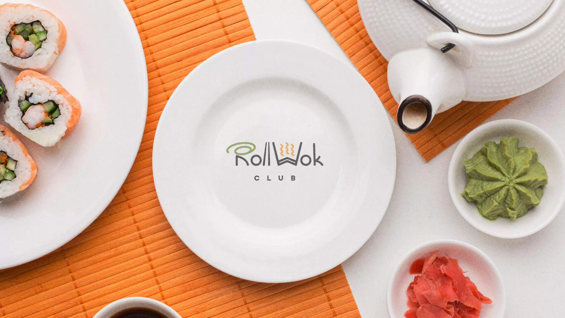 Разработка логотипа и фирменного стиля суши-бара «Roll Wok Club» в Тавде